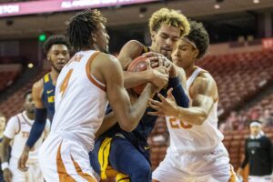 No. 13 West Virginia erases 19-point deficit to beat No. 12 Texas